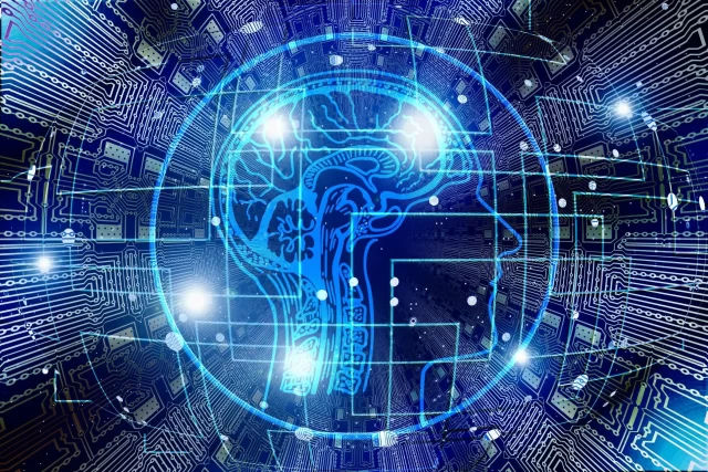 Digital visualization of a brain integrated into a circuit board to represent Switzerland's Lean Management.