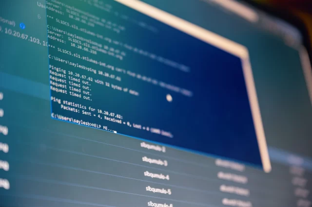 Command prompt showing a failed network connection while monitoring a portfolio at risk in Zürich.
