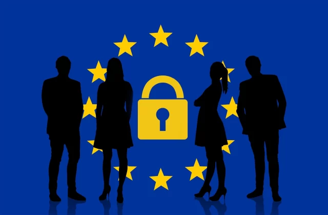 Silhouettes of professionals surrounding a golden padlock against a European Union flag, symbolizing data privacy in Swiss Adaptive Software Development.