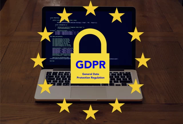 A padlock with the GDPR logo overlaid on a laptop screen, symbolizing data compliance for Swiss Risk Management Services.